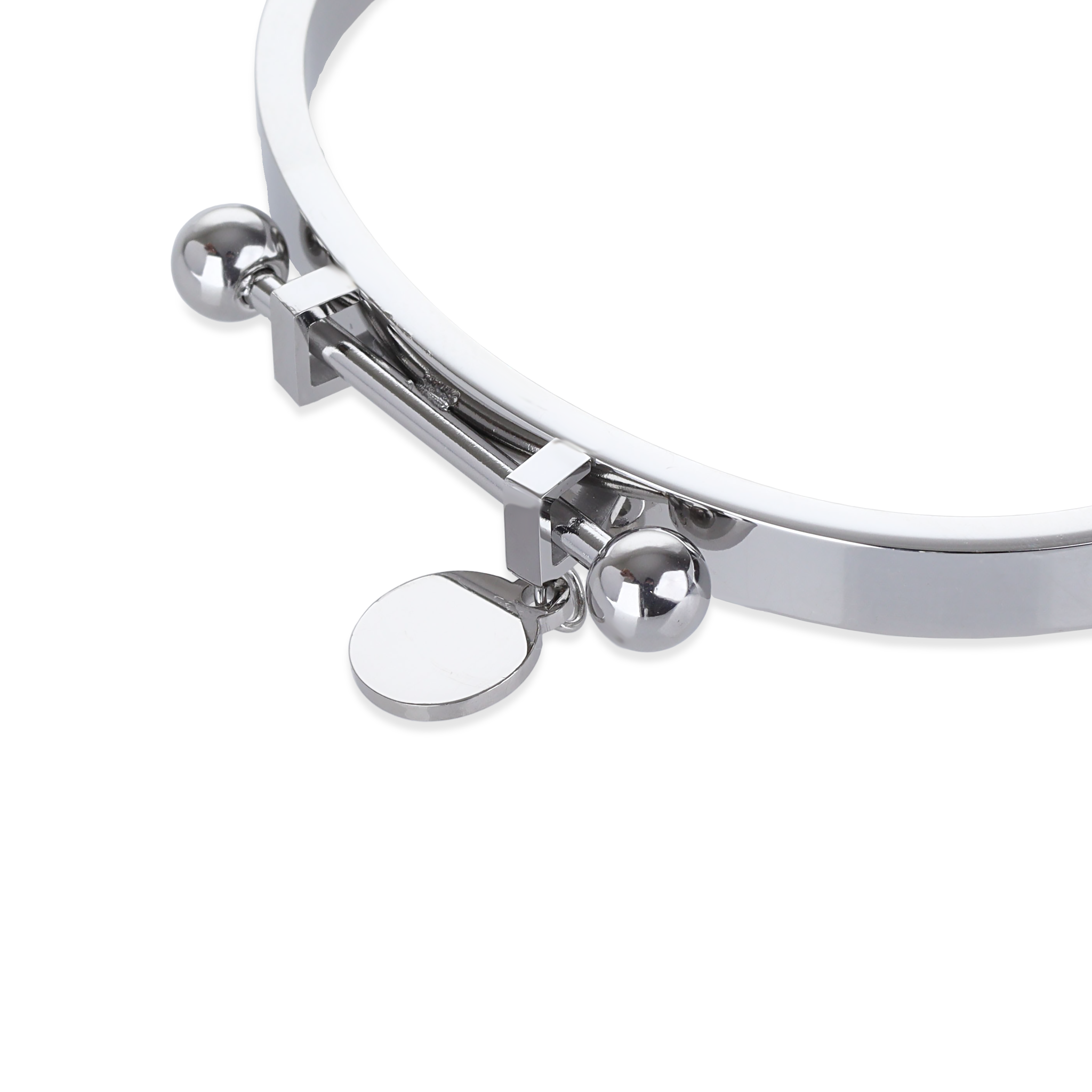 The Coins Bangle, a silver bangle bracelet with a unique toggle closure and a dangling coin charm. ||| SILVER