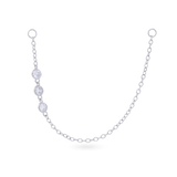 The Trio Diamond Earring Chain, a silver earring chain featuring three sparkling cubic zirconia stones.