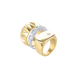 The Madness Ring Stack, a three-piece gold and silver ring stack featuring a gold pinky ring with a single diamond-like stone, a silver ring with diamond-like accents, and a gold ring with a textured geometric design.