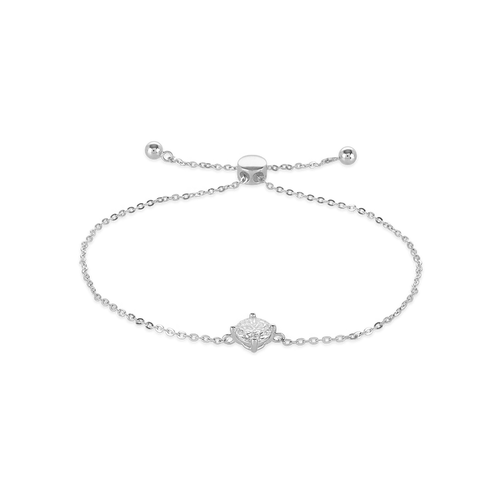 The Solitaire Adjustable Bracelet, a silver adjustable bracelet with a delicate chain and a single diamond-like stone cluster.