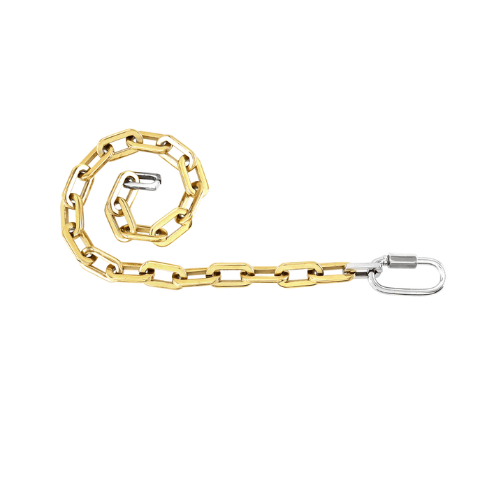 The Carabiner Puerto Necklace, which is a bold gold chain necklace featuring a unique silver carabiner clasp and silver accents. ||| MIX