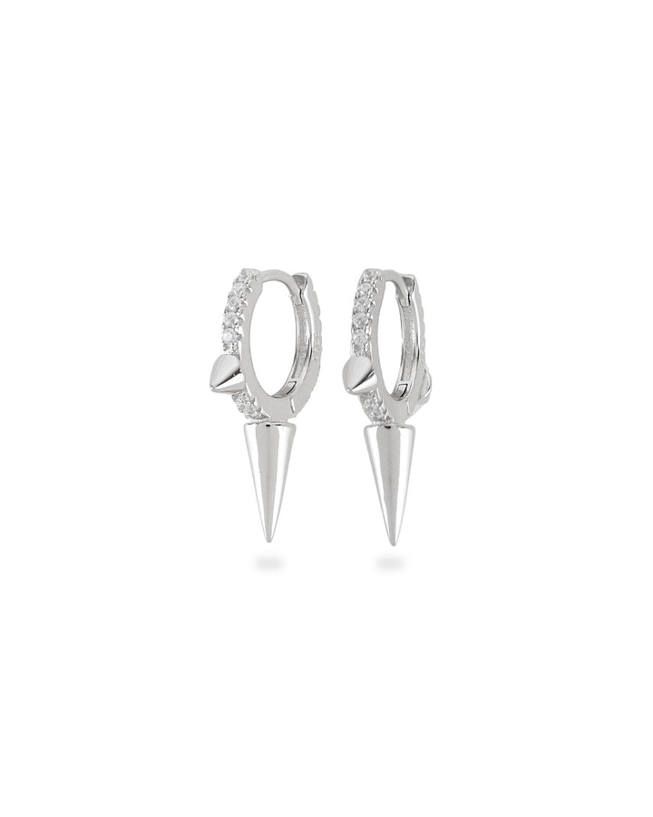 The One Shot Earring, a pair of silver hoop earrings featuring diamond-like accents and spike charms. ||| SILVER