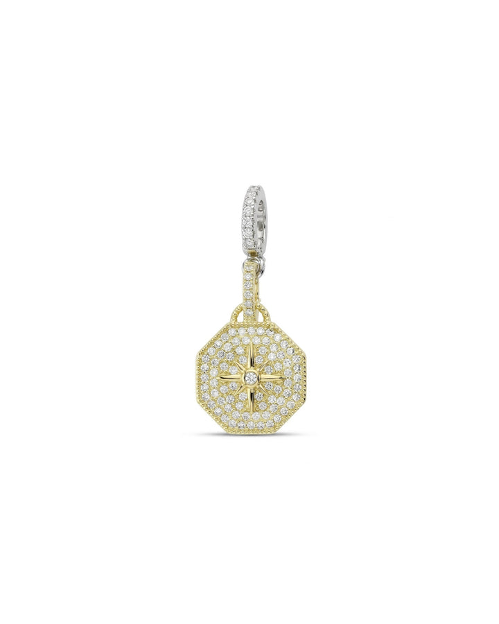 The NORTH CLIP ON CHARM which is made of Pave Clip on Stainless steel 18k gold plated Zirconia north star charm.