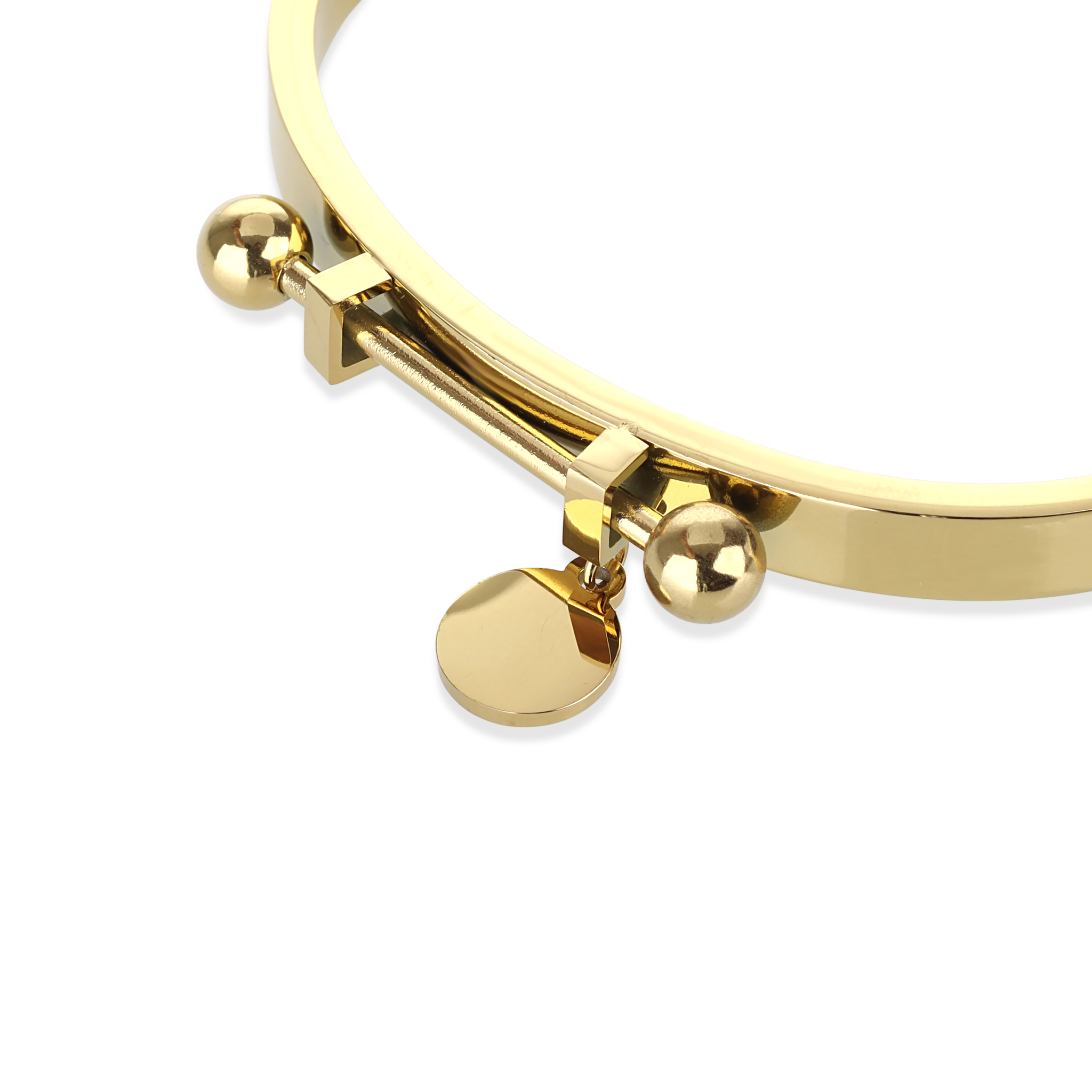 The Coins Bangle, a gold bangle bracelet with a unique toggle closure and a dangling coin charm. ||| GOLD