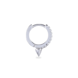 The MINI SHOT HOOP, which is a pair of sleek silver earrings, features a delicate hoop design adorned with sparkling cubic zirconia stones and finished with a pointed charm at the base for a modern edge. Perfect for adding a subtle yet bold statement to any outfit.