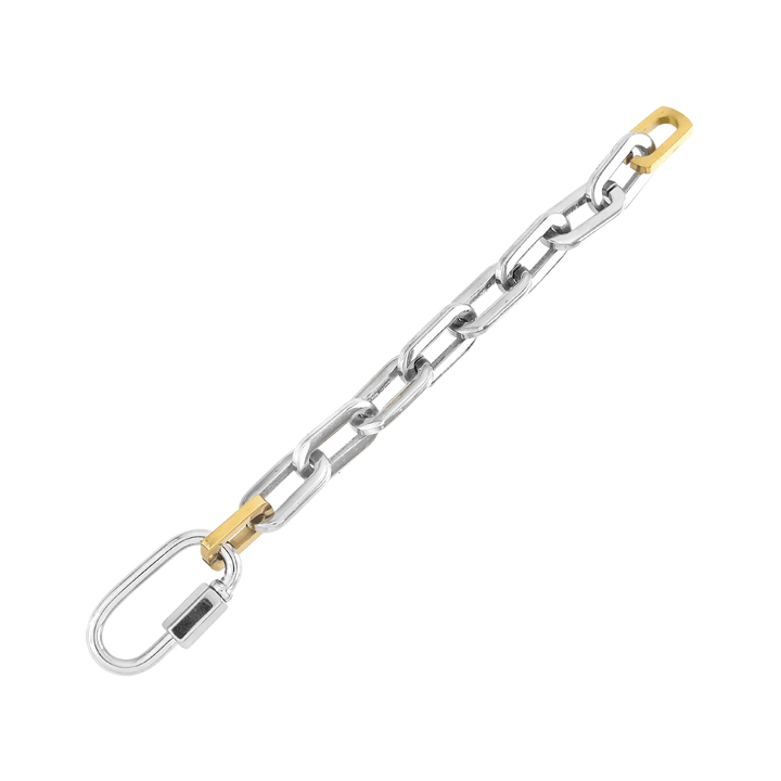 The CARABINER PUERTO BRACELET made of Stainless steel bulky link chain with silver carabiner. It has two 18k gold plated links close to the silver carabiner. ||| SILVER