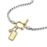 The Herradura Signature Charm Party, a mixed-metal necklace featuring a silver chain, gold-tone clasp, and 2 charm accents. ||| GOLD
