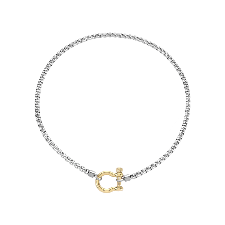 The Herradura Mix Necklace, a silver necklace featuring a box chain with a gold horseshoe clasp. |||Gold
