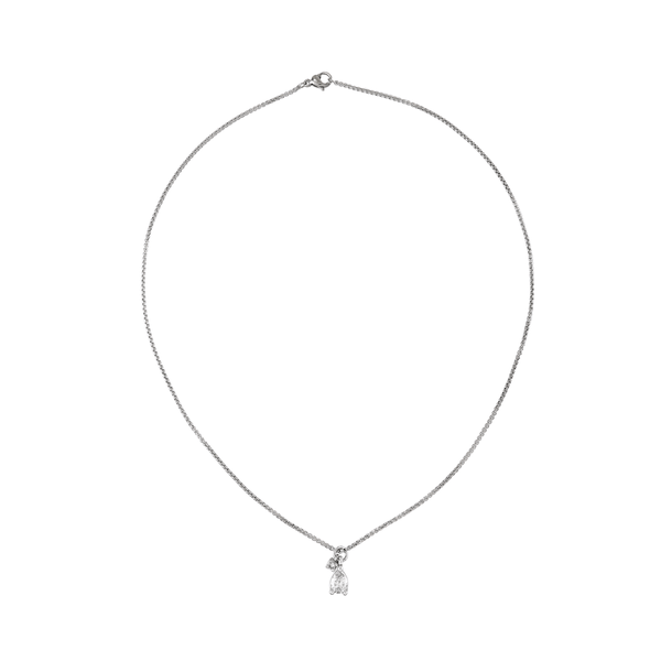 The DROP ZIRCONIA NECKLACE which is made of 1mm wide Stainless steel chain with two 18K gold plated sterling silver pave drop charms., one is a mini zirconia charm.
