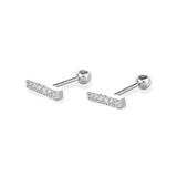 The Diamond Line Piercing, a set of sleek silver-tone stud featuring a horizontal row of sparkling cubic zirconia, perfect for minimalist elegance.