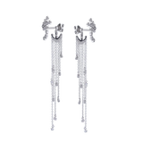 The Rain Drop Earrings, a pair of silver earrings featuring cascading chains with diamond-like accents.