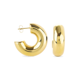 The Bagel Hoop, a pair of chunky gold hoop earrings with a rounded, torus shape.