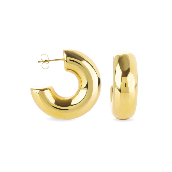 The Bagel Hoop, a pair of chunky gold hoop earrings with a rounded, torus shape.