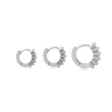3 pieces Tiny Huggies Hoop in different sizes, they're hoop earrings that feature a row of sparkling cubic zirconia stones set in a  pointed, triangular pattern.||| SILVER
