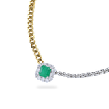 The Mixed Emerald Chain, a gold and silver chain featuring a single emerald stone accented with a diamond-like halo.