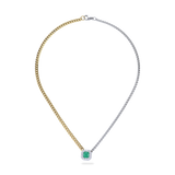 The Mixed Emerald Chain, a gold and silver chain featuring a single emerald stone accented with a diamond-like halo.