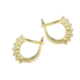 The Prong Hoops, which are a pair of stunning gold hoop earrings, feature dazzling prong-set crystals for an elegant and timeless design. These earrings are crafted with precision and are perfect for elevating any look, whether worn alone or layered with other jewelry pieces ||| GOLD