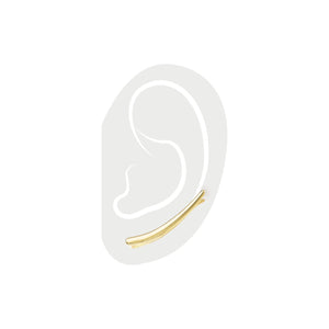 The Line Climber, which is a single-piece gold ear climber earring, features a sleek, minimalist curved design that elegantly traces along the curve of the ear for a chic, modern, and understated statement.