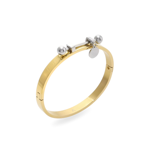 The Coin Bangle is a mixed-metal bracelet featuring a sleek gold band with silver-tone hardware, including a dangling coin charm and bold spherical accents. ||| MIX SILVER