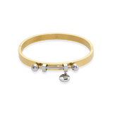 The Coin Bangle is a mixed-metal bracelet featuring a sleek gold band with silver-tone hardware, including a dangling coin charm and bold spherical accents. ||| MIX SILVER