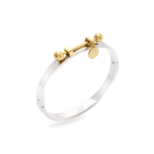 The Coin Bangle is a mixed-metal bracelet featuring a sleek silver band with gold-tone hardware, including a dangling coin charm and bold spherical accents. ||| MIX GOLD