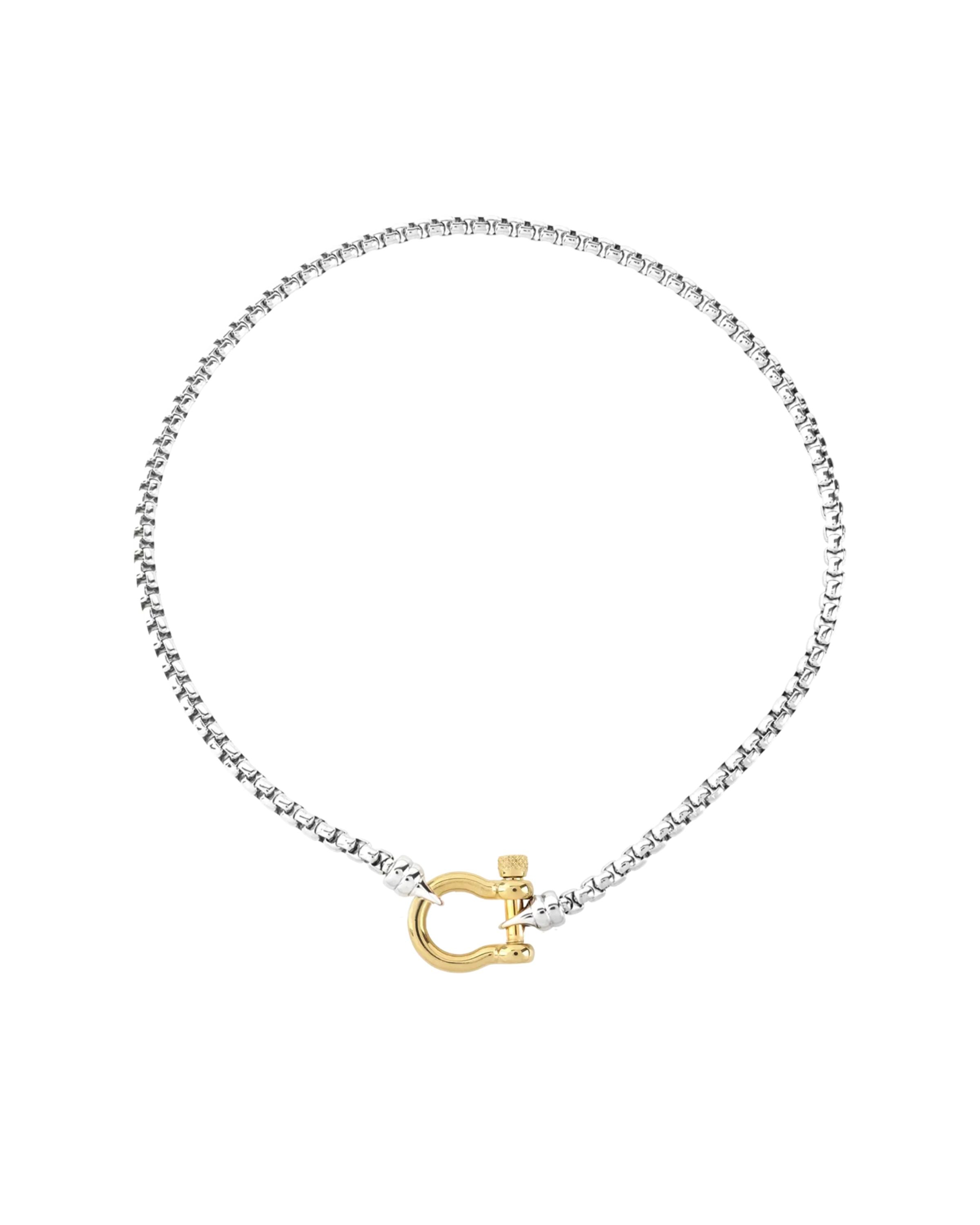 The Herradura Signature Mix, a silver necklace featuring a box chain with a gold horseshoe clasp. ||| GOLD