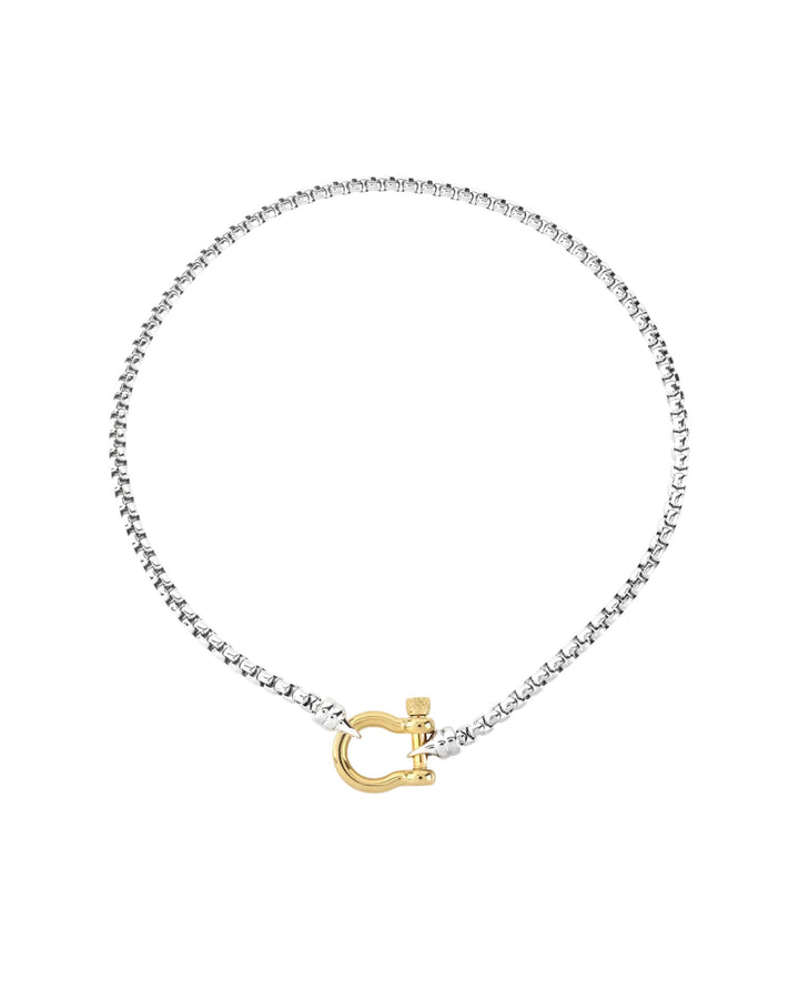 The Herradura Signature Mix, a silver necklace featuring a box chain with a gold horseshoe clasp. ||| GOLD