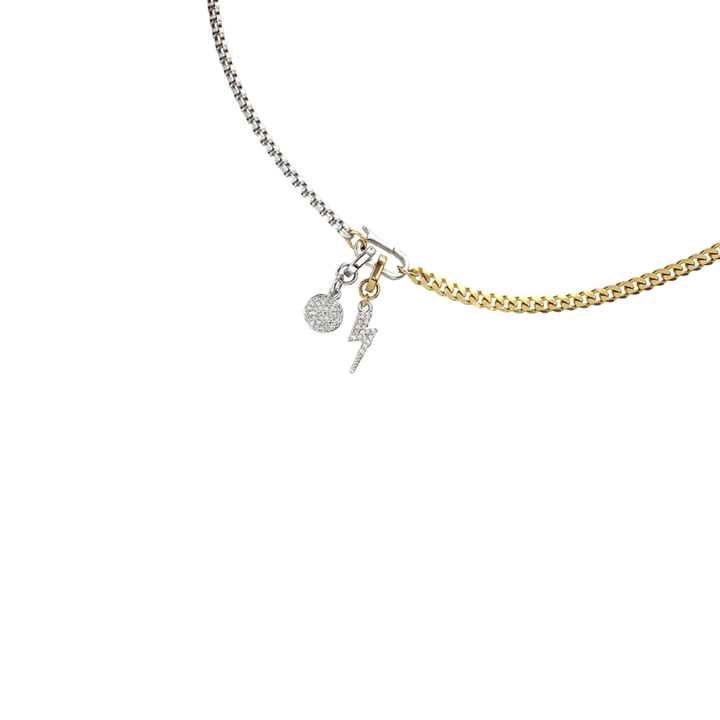 The Link Cuban Lightning Charm Necklace, a two-tone chain necklace featuring half silver and half gold chain with a lightning bolt charm and a circle charm accented with cubic zirconia. ||| MIX