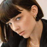 The Shape Hoop, which is a bold and elegant single-piece gold earring, features a unique and contemporary geometric design. Perfect for adding a modern touch to any outfit, this versatile piece effortlessly blends sophistication and style. ||| GOLD