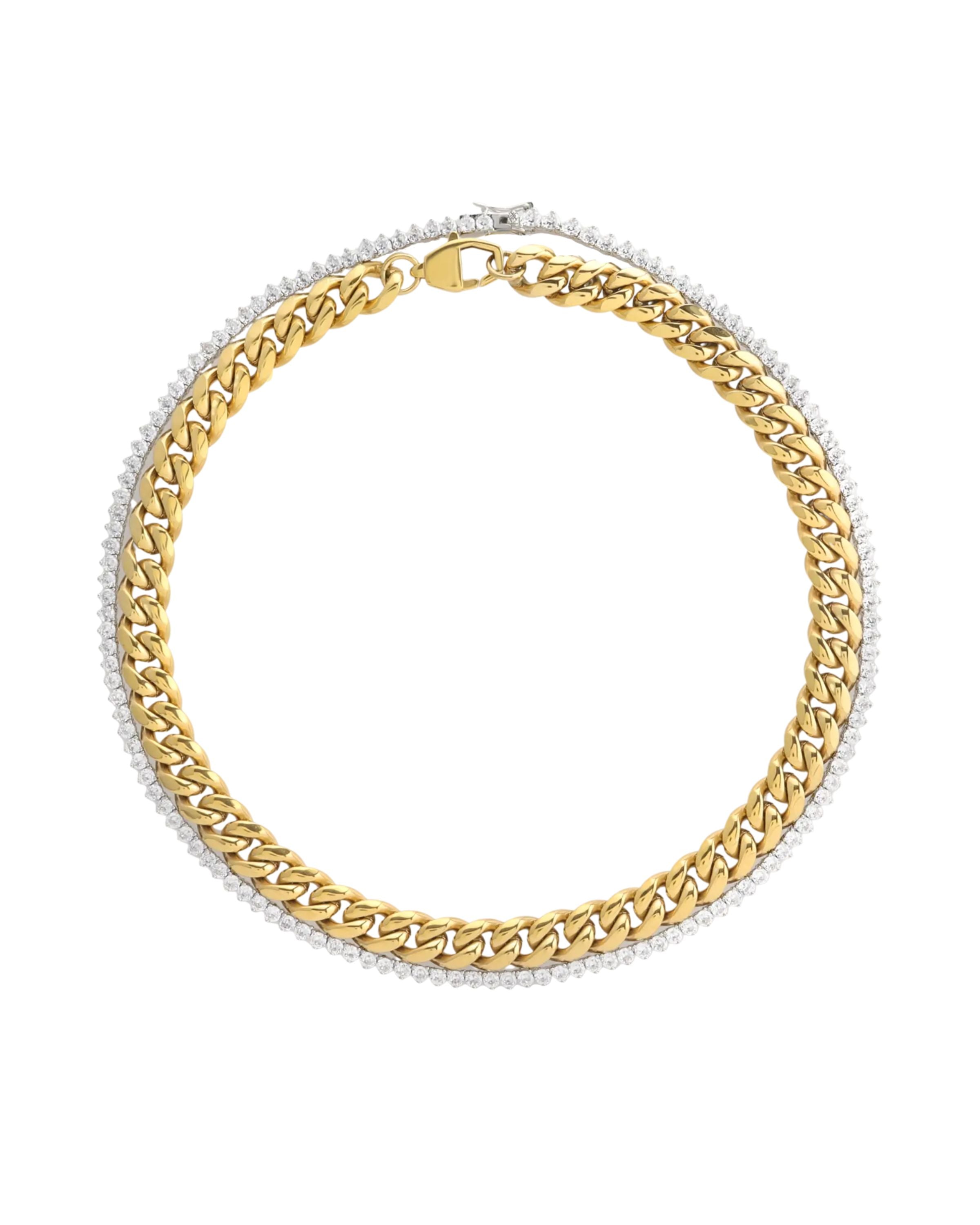 The TENNIS AND THE CURB CHAIN LAYERED NECKLACE SET which is a two-piece layered necklace stack featuring a gold chunky chain and a silver tennis necklace with round-cut stone. ||| GOLD