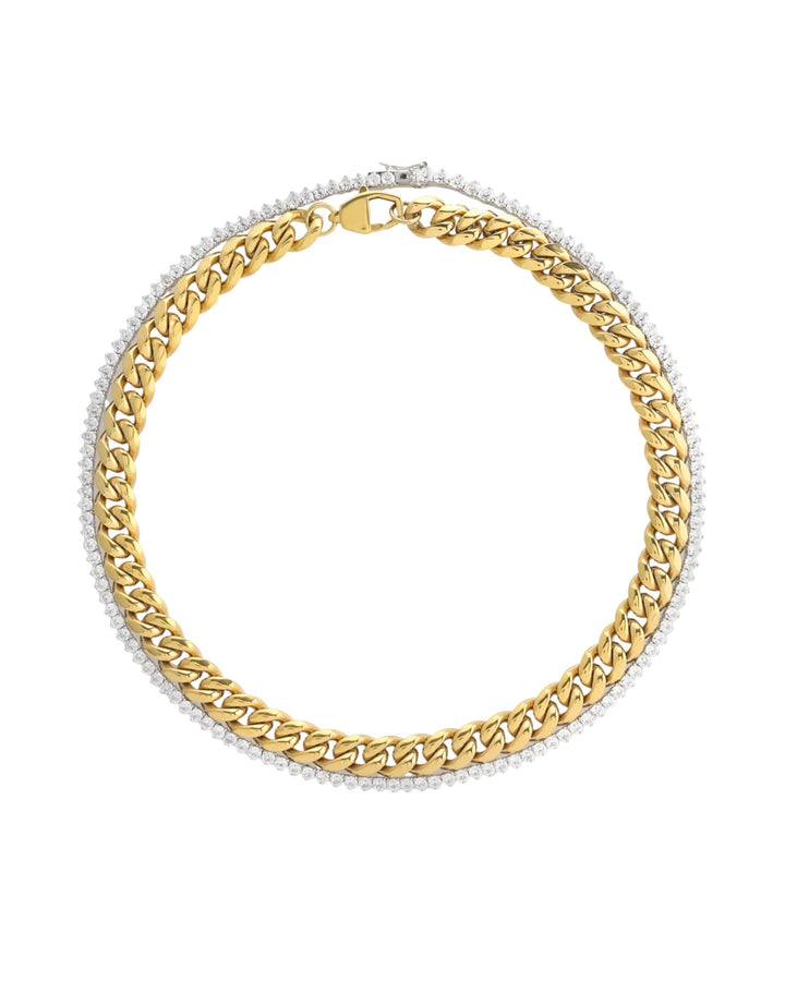 The TENNIS AND THE CURB CHAIN LAYERED NECKLACE SET which is a two-piece layered necklace stack featuring a gold chunky chain and a silver tennis necklace with round-cut stone. ||| GOLD