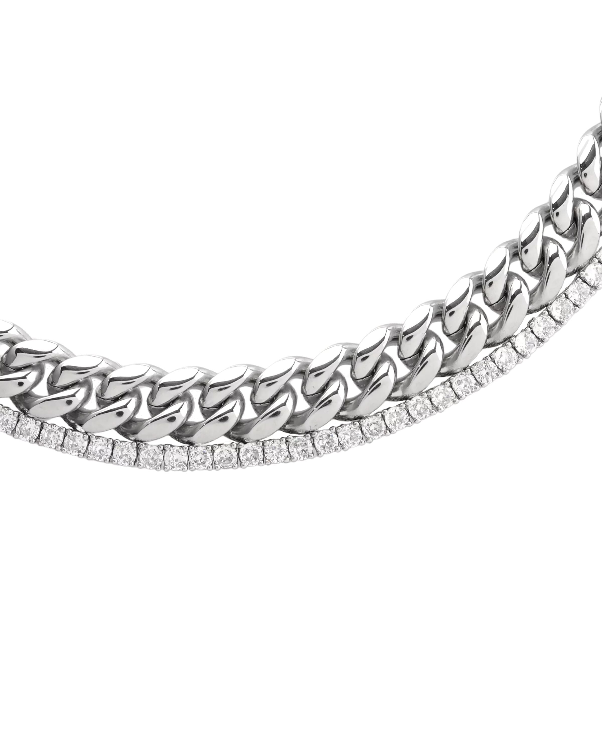 Close-up of a two-piece layered silver necklace stack featuring a chunky curb chain and a diamond-accented tennis chain. ||| SILVER