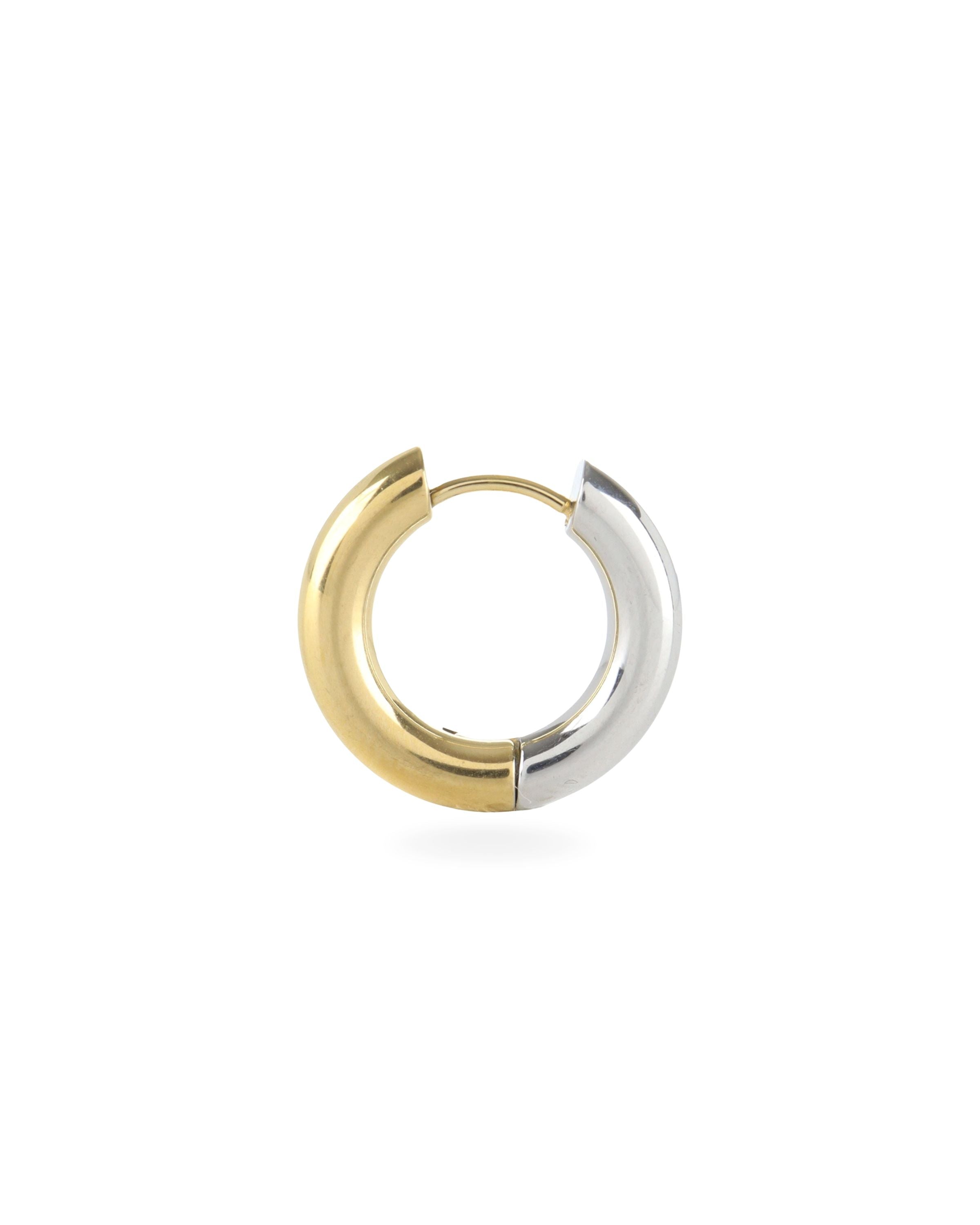 The Slim Mix Huggies, a chic pair of two-tone hoop earrings features a combination of gold and silver tones.