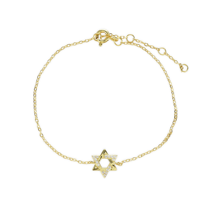 The Fine Guiding Star Bracelet, a delicate gold chain bracelet featuring a star-shaped charm encrusted with sparkling crystals. This elegant piece adds a touch of celestial-inspired beauty, perfect for wearing alone or layering with other bracelets for a stylish, meaningful look.