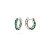 The Eternity Emerald Hoops, a pair of silver hoops featuring emerald accents.