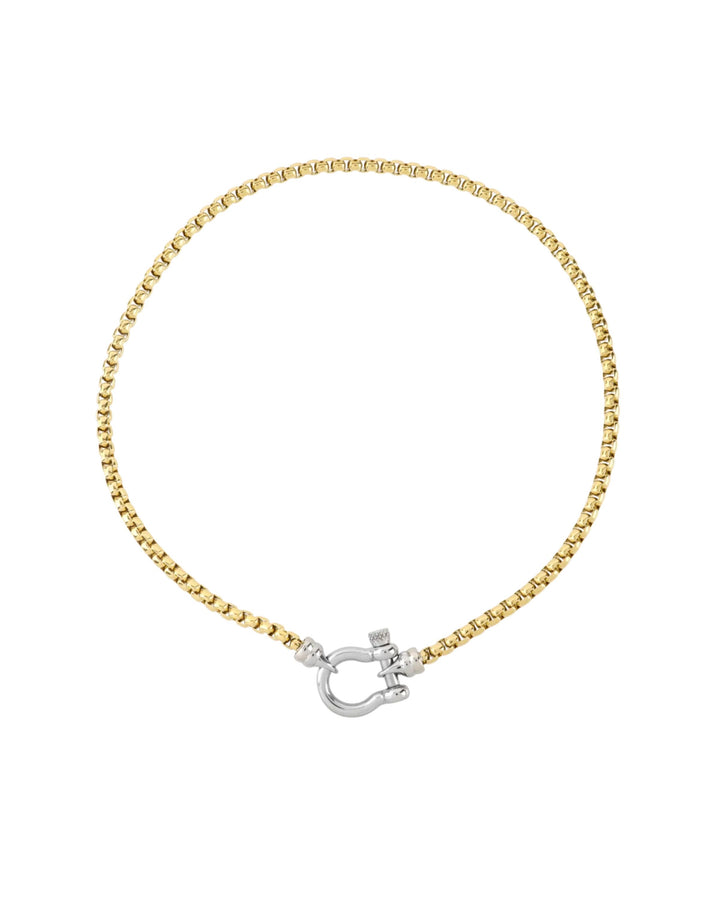 The Herradura Signature Mix, a gold necklace featuring a box chain with a silver horseshoe clasp. ||| SILVER