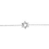 The Fine Guiding Star Bracelet, a delicate silver chain bracelet featuring a star-shaped charm encrusted with sparkling crystals. This elegant piece brings a celestial-inspired touch to any outfit, perfect for wearing alone or layered with other bracelets for a versatile, meaningful look.