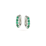 The Eternity Emerald Hoops, a pair of silver hoops featuring emerald accents.