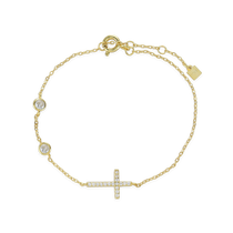 The Fine Cross Bracelet which is a gold bracelet featuring a dainty chain adorned with three shimmering diamonds and a cross charm set with sparkling diamonds. ||| GOLD