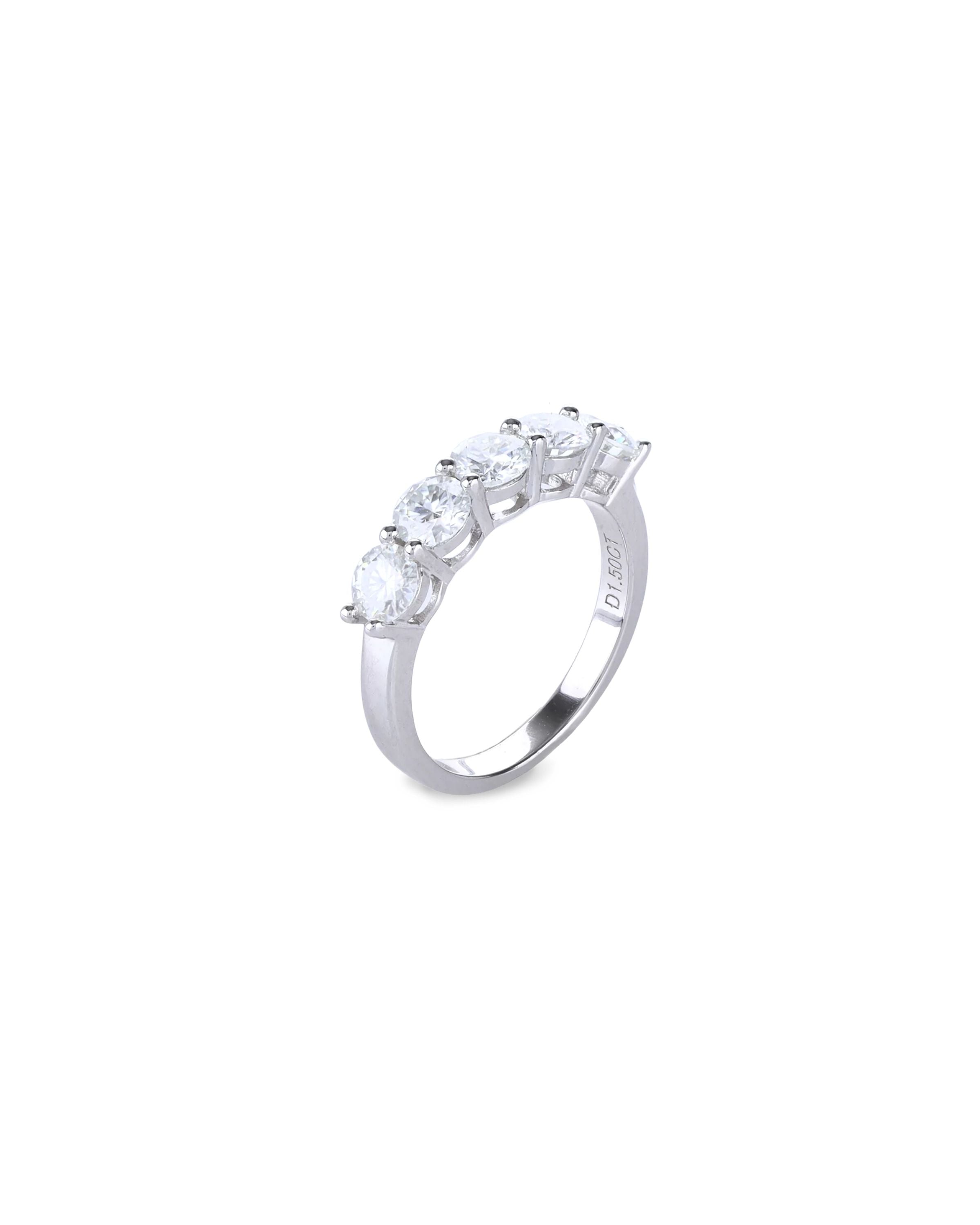 The Diamond Band Ring, a silver ring featuring five dazzling brilliant-cut diamonds.