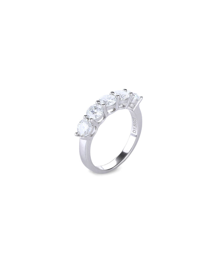 The Diamond Band Ring, a silver ring featuring five dazzling brilliant-cut diamonds.