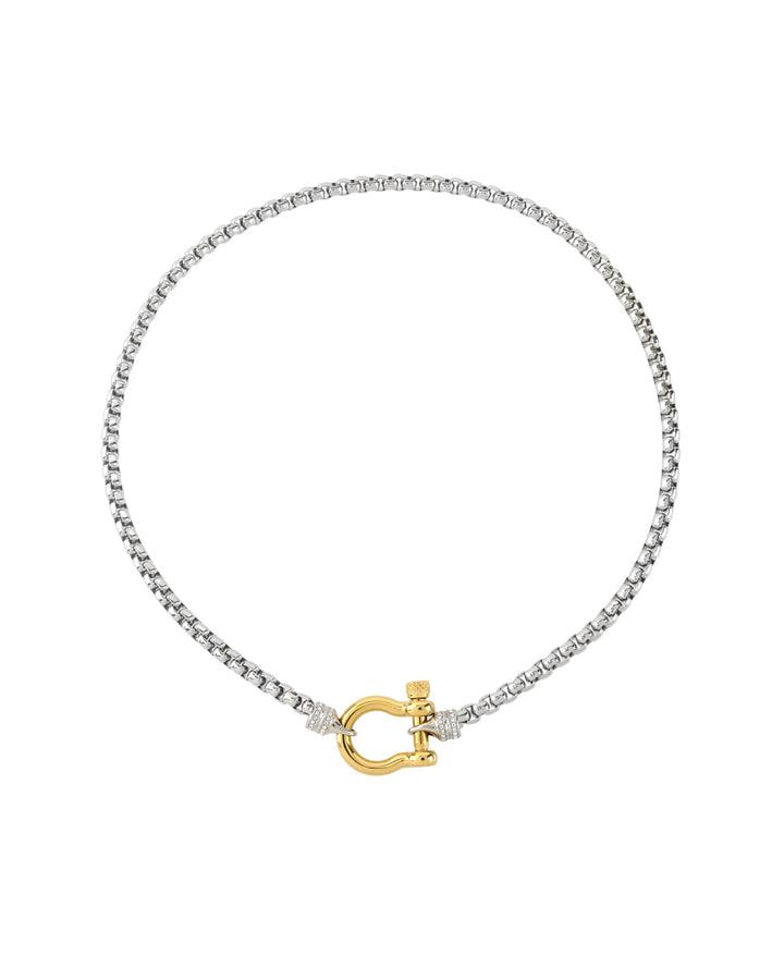 The Herradura Signature Pave Mix, a silver necklace featuring a box chain with a gold horseshoe clasp accented with pave-set diamond-like stones. |||Gold