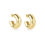 The Bagel Hoop, a pair of chunky gold hoop earrings with a rounded, torus shape.