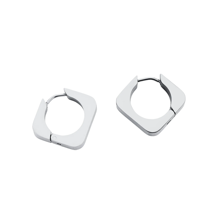 Silver geometric hoop earrings with a bold, modern design, featuring a sleek angular shape. ||| SILVER