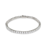 The Tennis Bracelet, which is a single elegant silver-tone bracelet featuring a continuous row of sparkling cubic zirconia stones, designed for timeless sophistication and versatility.