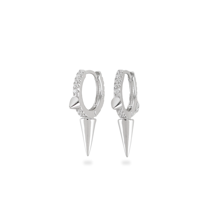 The One Shot Earring, a pair of silver hoop earrings featuring diamond-like accents and spike charms. ||| SILVER