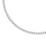 The Bubble Tennis Necklace which is a classic Tennis Necklace featuring a row of round diamonds set in a silver chain. 