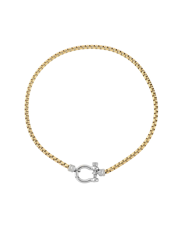 The Herradura Signature Pave Mix, a gold necklace featuring a box chain with a silver horseshoe clasp accented with pave-set diamond-like stones.  |||Silver