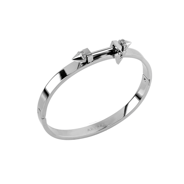 The Sasha's bangle made of 316L Stainless steel. It has a bar design on top with two spikes on each end. It has zirconia details and triangle charm as well.