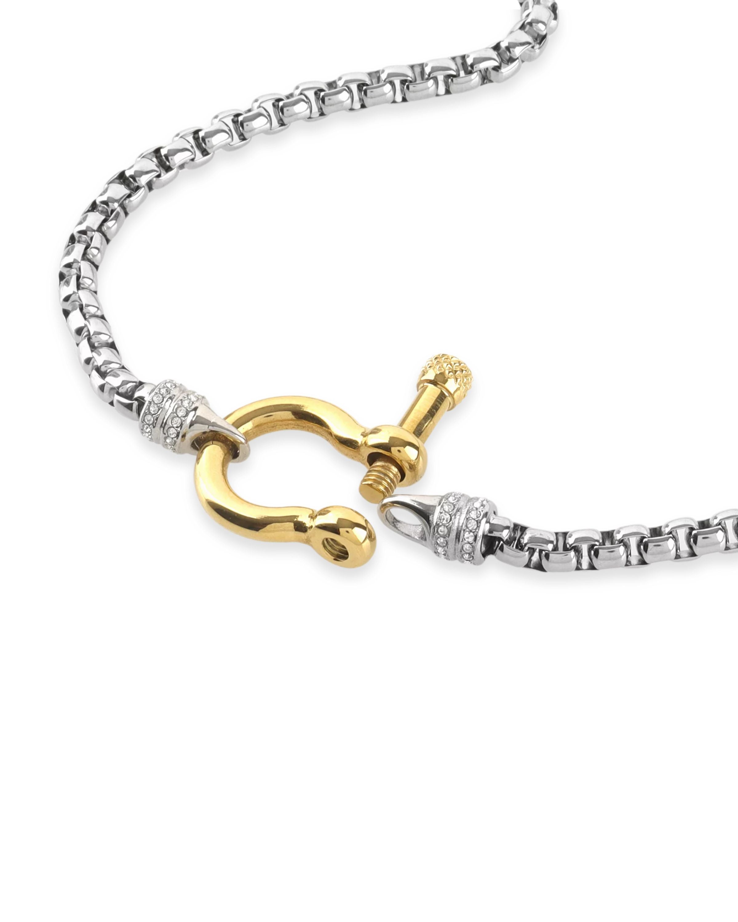 The Herradura Signature Pave Mix, a silver necklace featuring a box chain with a gold horseshoe clasp accented with pave-set diamond-like stones.  |||Gold